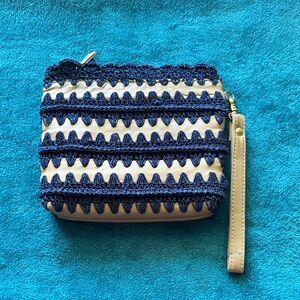 Clever Carriage Company Navy blue and tan Embroidered Wristlet. NWOT Very cute